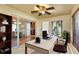 Office with sliding glass doors and large window at 4375 Tortoise Rd, Venice, FL 34293