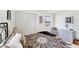 Comfortable bedroom with a queen-sized bed, classic décor, and bright natural lighting at 4535 Maceachen Blvd, Sarasota, FL 34233
