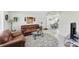 Bright and airy living room with view into the dining area, great for entertaining guests at 4535 Maceachen Blvd, Sarasota, FL 34233