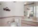 Powder room features a vanity with sink and toilet at 4622 34Th E Ct, Bradenton, FL 34203