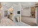 Open kitchen features wooden cabinets and stainless steel appliances with breakfast bar at 4622 34Th E Ct, Bradenton, FL 34203