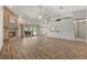 Spacious living room features a brick fireplace, high ceilings, and sliding doors to the patio at 4622 34Th E Ct, Bradenton, FL 34203