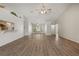 Large living room with hardwood floors and ample natural light at 4622 34Th E Ct, Bradenton, FL 34203