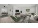 Spacious living room with an open floor plan, laminate floors, and contemporary decor at 478 Orange Nw Dr, Port Charlotte, FL 33952