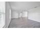 Light-filled living room with new wood-look flooring and an open, airy feel at 478 Orange Nw Dr, Port Charlotte, FL 33952