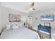 Comfortable bedroom showcasing a bed, a blue dresser, and tasteful decorations, creating a serene atmosphere at 4844 14Th E Ave, Bradenton, FL 34208