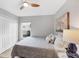 Relaxing bedroom with a cozy bed, window, closet and stylish decor at 4844 14Th E Ave, Bradenton, FL 34208