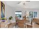 Inviting dining space featuring water views, comfortable seating, and lots of natural light at 4844 14Th E Ave, Bradenton, FL 34208