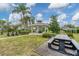 Well-maintained community gazebo sitting next to picnic tables and lush tropical landscaping at 4844 14Th E Ave, Bradenton, FL 34208