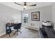 Bright office space with a desk, chair, sailboat decor, and a view from the window at 4844 14Th E Ave, Bradenton, FL 34208