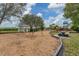 Community playground area with swings, playground equipment, a gazebo, and a picnic table at 4844 14Th E Ave, Bradenton, FL 34208