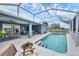 Spacious screened pool area with ample seating, ideal for outdoor entertaining near the water at 4844 14Th E Ave, Bradenton, FL 34208