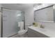 Updated bathroom with a shower, modern vanity, mirror and decorative accents at 500 N Jefferson Ave # G5, Sarasota, FL 34237