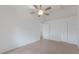 Neutral bedroom featuring tile floors, neutral walls and ceiling fan at 500 N Jefferson Ave # G5, Sarasota, FL 34237
