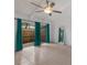 Bright living room showcasing tile floors, sliding doors to the backyard, and ample lighting at 500 N Jefferson Ave # G5, Sarasota, FL 34237