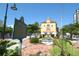 Historic Burns Court Herald Square with charming architecture, a fountain, and outdoor seating at 500 N Jefferson Ave # G5, Sarasota, FL 34237