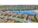 Overhead view showcasing community homes with serene lake access at 5011 Tivoli Run, Bradenton, FL 34211