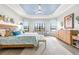 Inviting main bedroom features serene decor, expansive windows, and a tranquil ambiance for restful nights at 5011 Tivoli Run, Bradenton, FL 34211