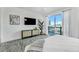 This bedroom offers a balcony with a beautiful view at 5219 Calle Menorca, Sarasota, FL 34242