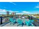 Roof deck with comfortable seating and stunning views of the city and ocean at 5219 Calle Menorca, Sarasota, FL 34242