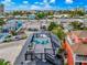 Aerial view of the rooftop deck with chairs and appliances at 5219 Calle Menorca, Sarasota, FL 34242