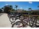 Bicycles parked at a bike rack near community buildings, encouraging an active lifestyle at 5330 Hyland Hills Ave # 2324, Sarasota, FL 34241