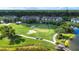 Beautifully maintained golf course with sand traps and electric golf carts at 5330 Hyland Hills Ave # 2324, Sarasota, FL 34241