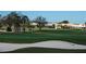 Beautifully manicured golf course with lush green fairways, sand traps, and well-placed flags, offering a challenging game at 5330 Hyland Hills Ave # 2324, Sarasota, FL 34241
