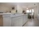 Modern kitchen with updated appliances, sleek countertops, and generous space at 5330 Hyland Hills Ave # 2324, Sarasota, FL 34241
