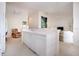 Open concept view from the kitchen into the living room area with lots of natural light at 5330 Hyland Hills Ave # 2324, Sarasota, FL 34241