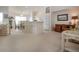 Spacious living area with breakfast bar and dining table, featuring bright spaces and comfortable seating, ideal for gatherings at 5330 Hyland Hills Ave # 2324, Sarasota, FL 34241