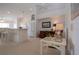 Open floor plan with breakfast bar and living area, featuring bright spaces and comfortable seating, ideal for entertaining at 5330 Hyland Hills Ave # 2324, Sarasota, FL 34241