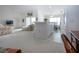 Open concept layout connecting the living area to the kitchen, creating a seamless flow for entertaining and everyday living at 5330 Hyland Hills Ave # 2324, Sarasota, FL 34241