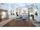 Elegant lobby with hardwood floors, stylish seating, and decorative accents creating a welcoming atmosphere at 5330 Hyland Hills Ave # 2324, Sarasota, FL 34241
