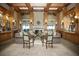Inviting lobby with comfortable seating, fireplace, and elegant decor at 5330 Hyland Hills Ave # 2324, Sarasota, FL 34241
