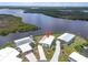 Waterfront homes boast easy canal access on landscaped lots in this sunny, tropical neighborhood at 550 Tampico Dr, North Port, FL 34287