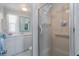 Neutral bathroom featuring a vanity, toilet, and a standing shower at 550 Tampico Dr, North Port, FL 34287