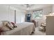 Cozy bedroom with two closets, a desk and a tv at 550 Tampico Dr, North Port, FL 34287