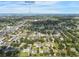 This aerial view shows a Siesta Key area home in a developed neighborhood with ocean access at 5639 Blount Ave, Sarasota, FL 34231