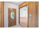 Inviting foyer features tile flooring, wood accents, and a glimpse into the spacious, light-filled living area at 5639 Blount Ave, Sarasota, FL 34231