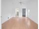 Bright bedroom boasts hardwood floors and closet access to en suite bathroom at 5639 Blount Ave, Sarasota, FL 34231