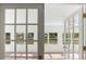 Office has bright lighting, white trim, and french doors at 5639 Blount Ave, Sarasota, FL 34231
