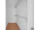 White walk-in closet with custom shelving at 5639 Blount Ave, Sarasota, FL 34231