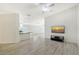 Bright living room featuring light wood floors and modern decor at 5787 Ivrea Dr, Sarasota, FL 34238