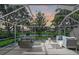 Staged patio with furniture and view of a lake at 5787 Ivrea Dr, Sarasota, FL 34238