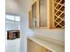 Contemporary kitchen area with sleek counters, lighting, cabinets, and a partial view at 5905 32Nd E St, Ellenton, FL 34222