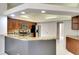 Bright kitchen features granite countertops, stainless steel appliances, and wood cabinets at 5905 32Nd E St, Ellenton, FL 34222