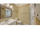 This bathroom features a walk-in shower and a stacked washer and dryer at 631 N Orange Ave # 208, Sarasota, FL 34236