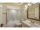 The bathroom features a shower-tub combination and a large mirror at 631 N Orange Ave # 208, Sarasota, FL 34236