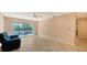 Bright living room featuring a large window with lots of natural light at 631 N Orange Ave # 208, Sarasota, FL 34236